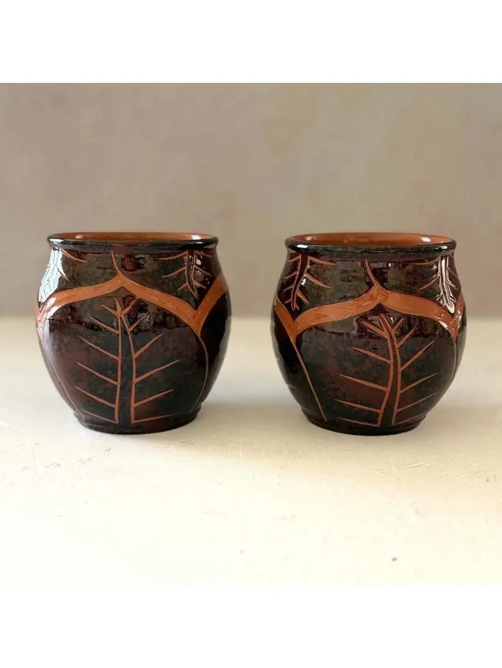 Wassi Art Jamaican Pottery Mug Pair | Hand Carved Leaf Redware Coffee Cups